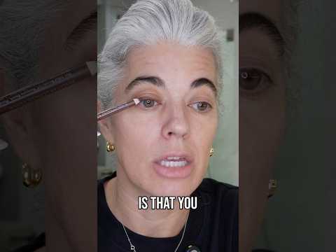 Nikol Johnson showing an eyeliner lifting trick for hooded eyes