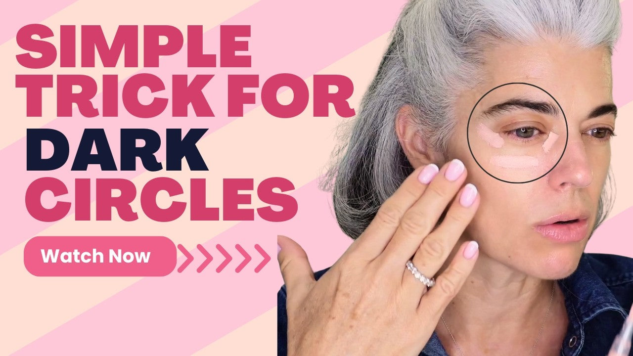 Nikol Johnson demonstrating how to cover dark circles on mature skin