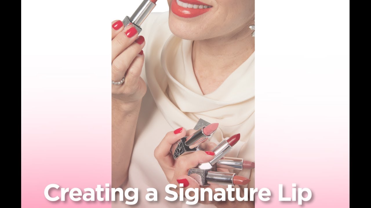 Nikol Johnson teaching how to create a signature lip in a beauty masterclass