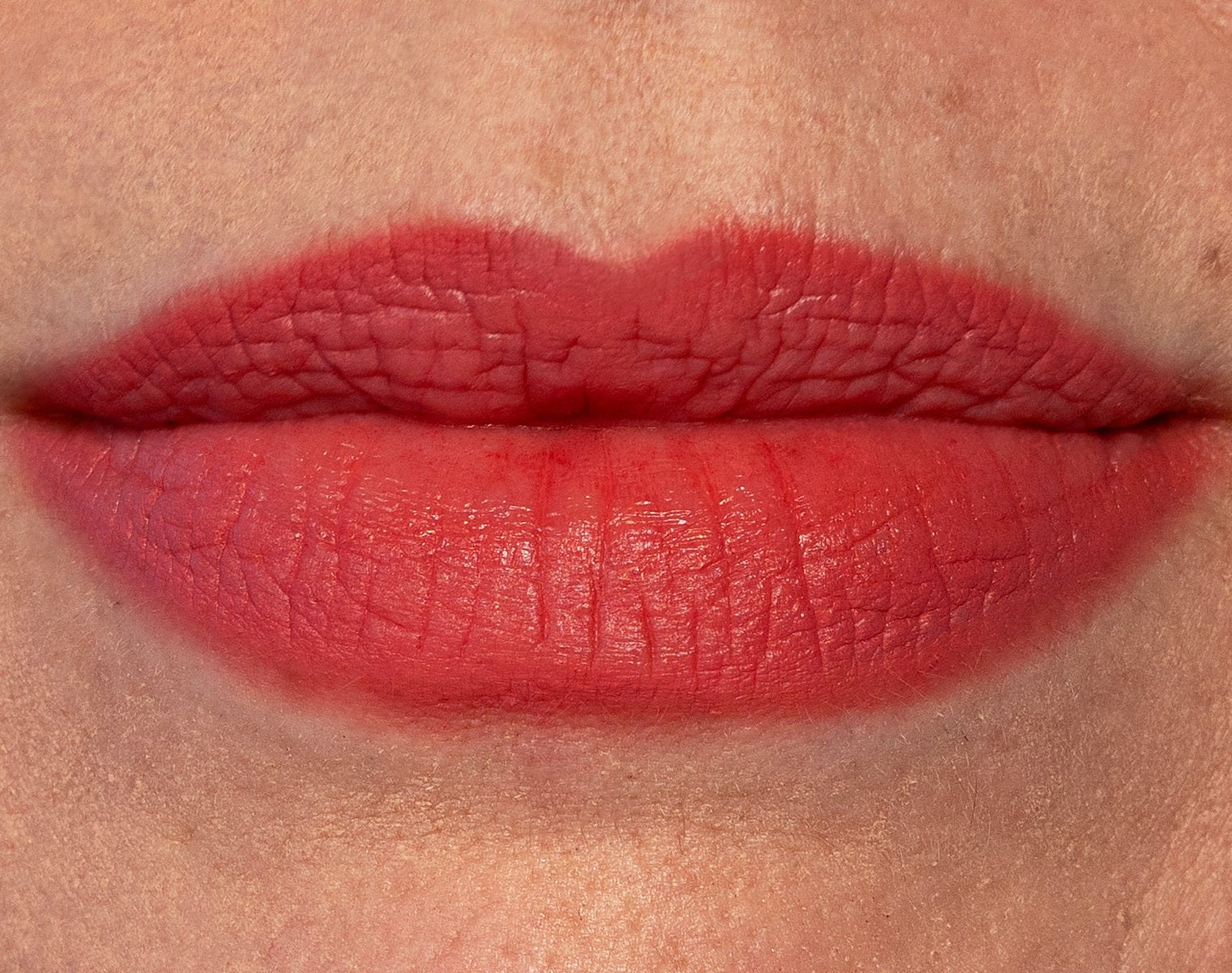 Mature lips lined and filled with Coral WaterProof Lip Liner